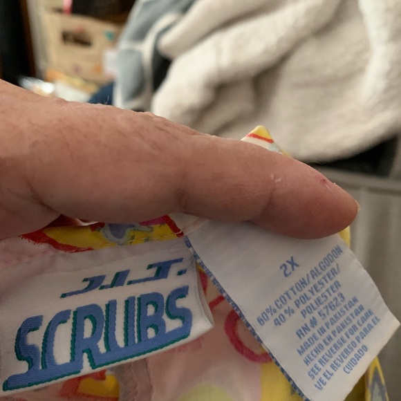 It is a scrub top - Picture 1 of 3